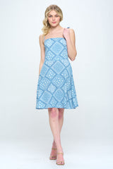 Paisley printed spagetti strap tie shoulder smocked back A-line dress