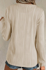 Apricot Wavy Textured Solid Color Drop Shoulder Pullover Top