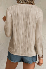 Apricot Wavy Textured Solid Color Drop Shoulder Pullover Top