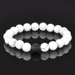 POLISHED 10MM NATURAL STONE BEAD STRETCH BRACELET - HOWLITE