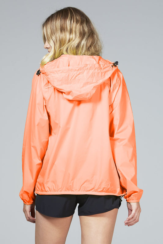 Women's orange fluo full zip packable rain jacket and windbreaker