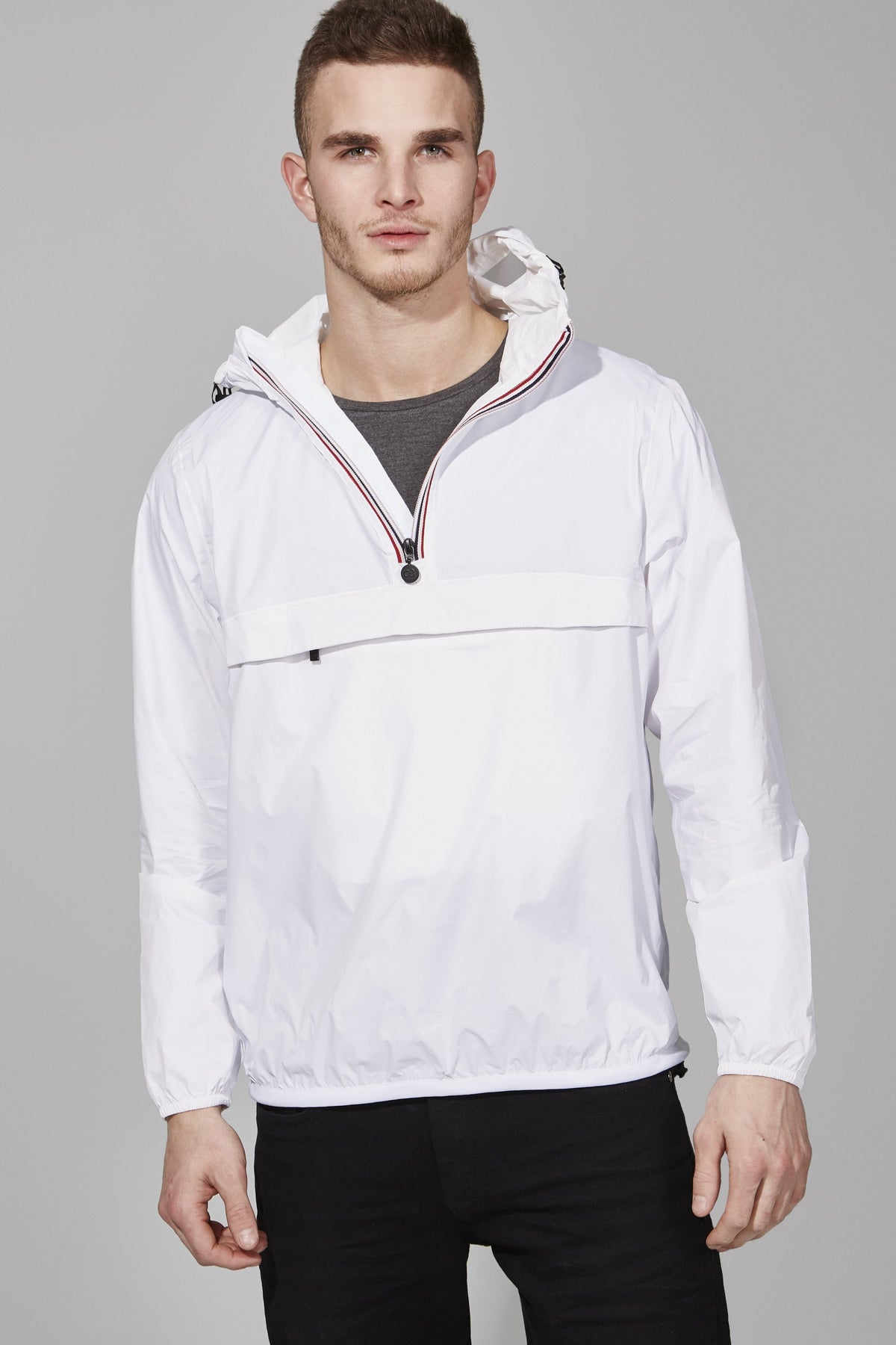 White quarter zip packable Rain jacket and windbreaker