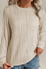 Apricot Wavy Textured Solid Color Drop Shoulder Pullover Top