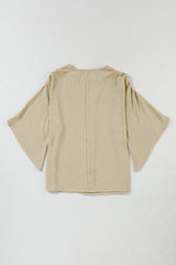 Parchment Solid Color Crinkled V Neck Ruffled Sleeve Blouse